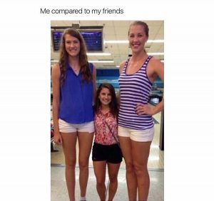 Short girl with tall friends